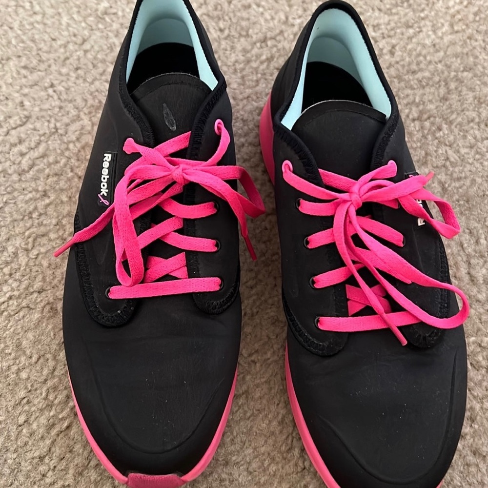 Black and pink Reebok